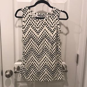 Tan and black sleeveless shirt. NWOT